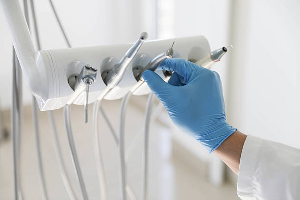 Professional Tooth Extraction technician working in Gig Harbor, WA